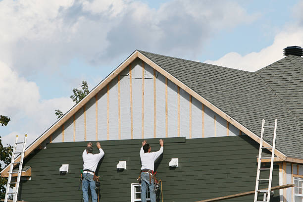 Professional Siding Installation technician working in Pelham, NC